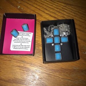 Cross necklace, with matching earrings.